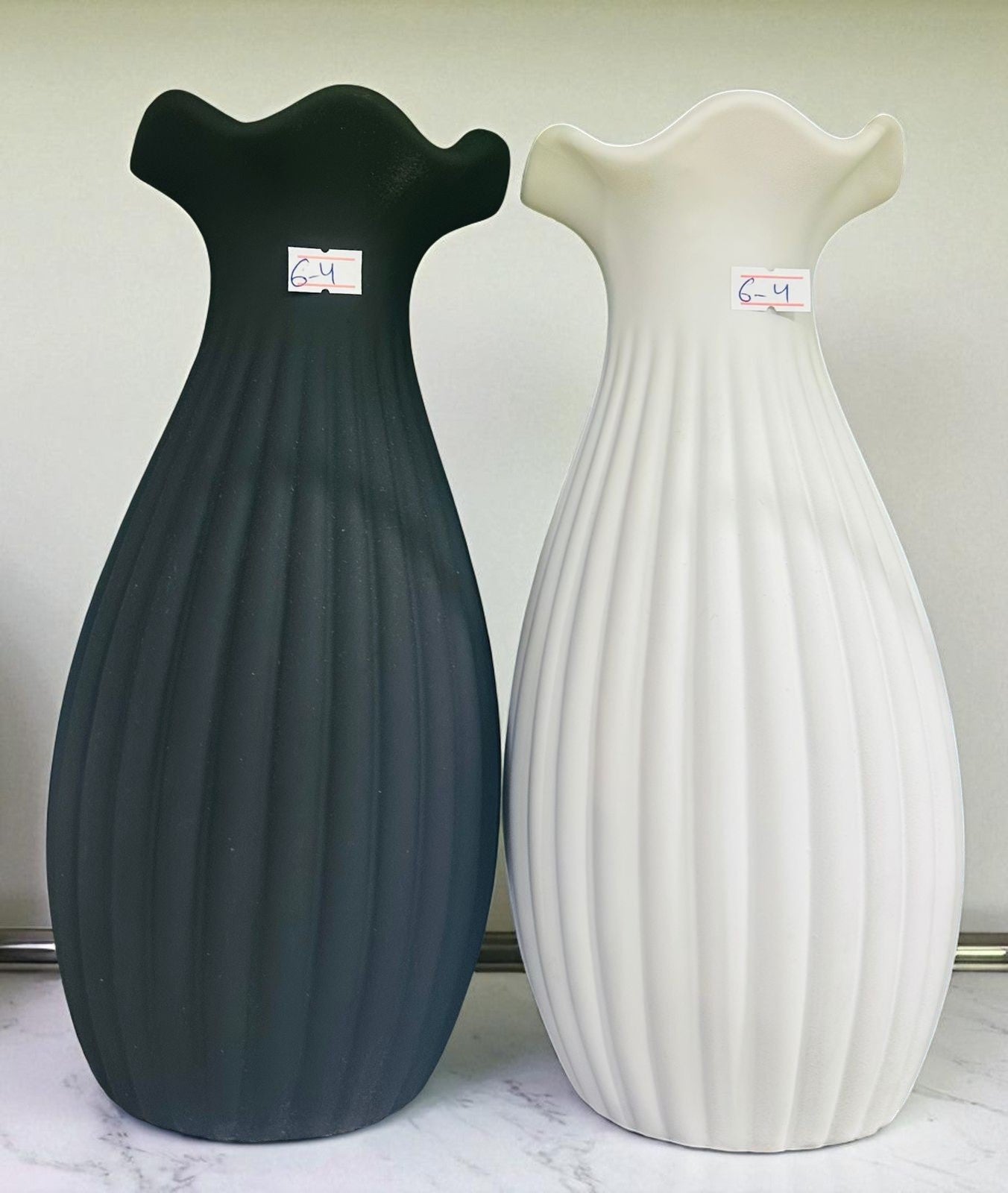 BLACK AND WHITE RIBBED VASES